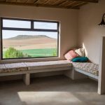 Porcupine room living area with mountain view